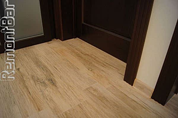 курамический гранит в коридоре и гостиной